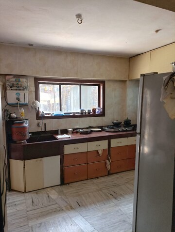 Kitchen in 2 BHK Apartment at Paradise Tower Naupada, Naupada – for Rent