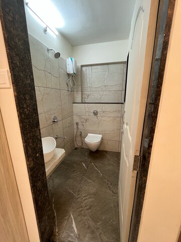 Bathroom in 1 BHK Apartment at Shreeji BKC Crown, Kapadia Nagar – for Sale