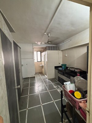 Kitchen in 1 BHK Apartment at Shree Kolungade CHS, Uthalsar – for Sale