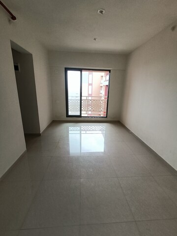 Living Room in 1 BHK Apartment at Lodha Panacea Phase 2, Dombivli East – for Rent