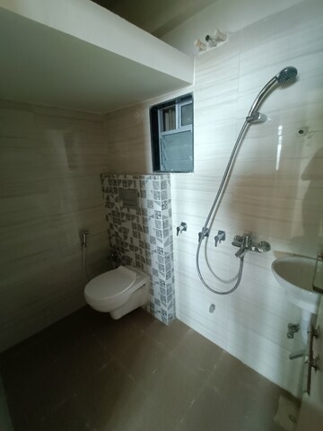 Bathroom in 1 BHK Apartment at Lodha Panacea Phase 2, Dombivli East – for Rent