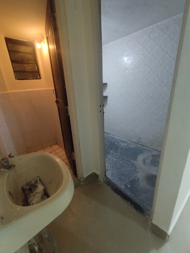 Bathroom, akshay-classic 1 Bedroom 600 Sq.Ft. Apartment In Pimple Gurav Pune 8831816