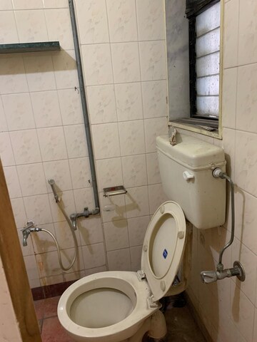 Bathroom in 1 BHK Apartment at Flower Valley Complex, Khopat – for Rent