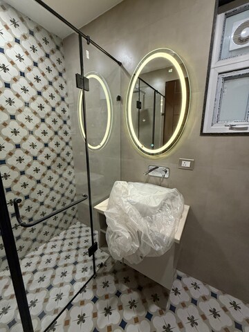 Bathroom in 4 BHK Builder Floor at Green Fields Colony – for Rent