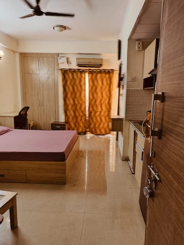 Living Room in 1 RK Apartment at Supertech Eco Suites, Sector 137 – for Rent