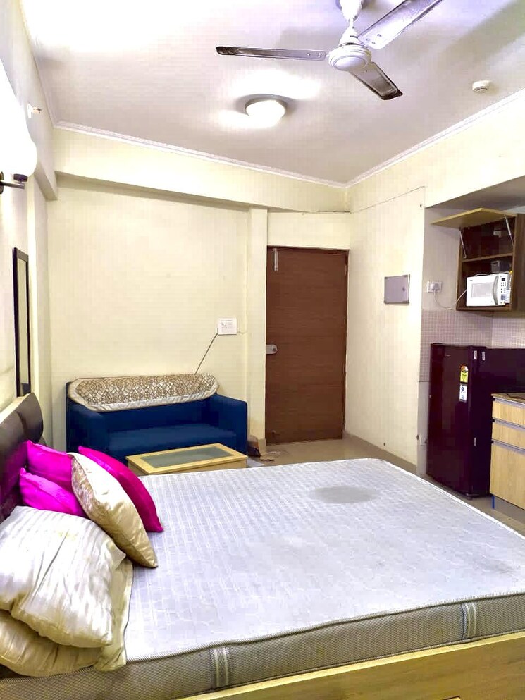 Bedroom, supertech-eco-suites 1 RK 455 Sq.Ft. Apartment In Sector 137 Noida 8832574