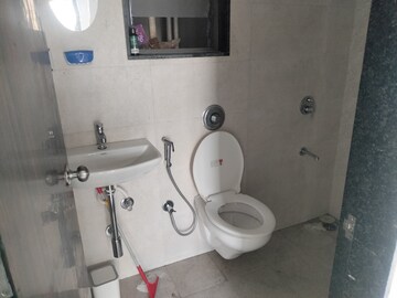 Bathroom in 1 BHK Apartment at Ruparel Elara, Kandivali West – for Rent