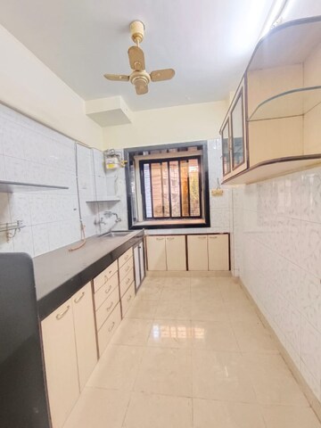 Kitchen in 1 BHK Apartment at Bulwala Building, Kalbadevi – for Rent