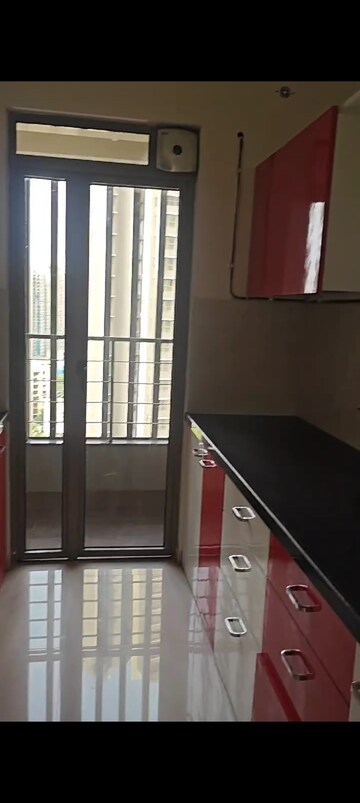 Kitchen in 2 BHK Apartment at Kalpataru Paramount, Kapur Bawdi – for Rent