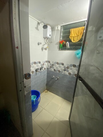 Master Bedroom in 1 RK Apartment at Nagari Niwara CHS, Goregaon East – for Rent