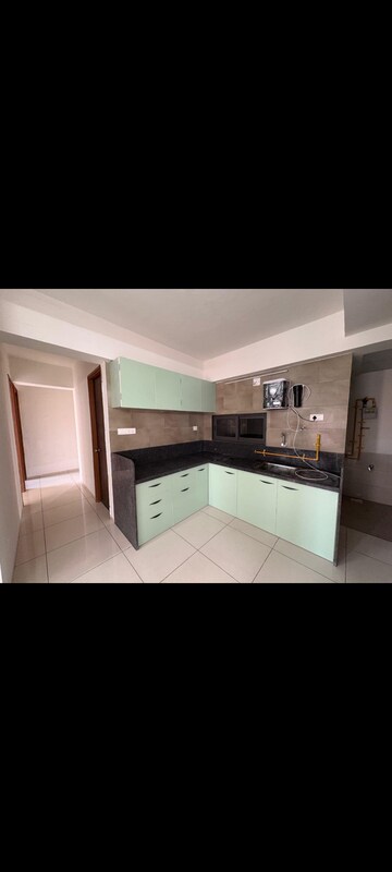Kitchen in 3 BHK Apartment at Adani Elysium, Near Vaishno Devi Circle On Sg Highway – for Rent