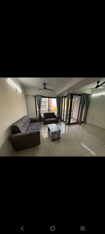 Living Room in 3 BHK Apartment at Adani Elysium, Near Vaishno Devi Circle On Sg Highway – for Rent