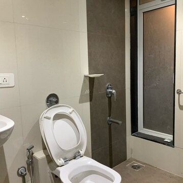 Bathroom in 2 BHK Apartment at Paradigm Ananda Residency, Babhai Naka – for Rent