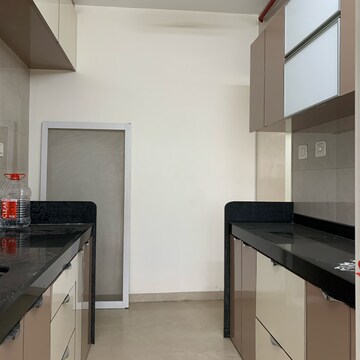 Kitchen in 2 BHK Apartment at Paradigm Ananda Residency, Babhai Naka – for Rent
