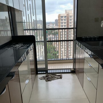 Kitchen in 2 BHK Apartment at Paradigm Ananda Residency, Babhai Naka – for Rent
