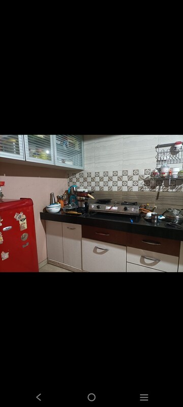Kitchen in 1 BHK Apartment at Applewood Satyesh Residency, Shela – for Rent