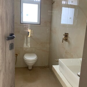 Bathroom in 2 BHK Apartment at Rander Komal Kounteya CHS, Prerna Nagar – for Sale