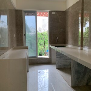 Kitchen in 2 BHK Apartment at Vasudev Terrace, Kastur Park – for Sale