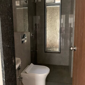 Bathroom in 2 BHK Apartment at Vasudev Terrace, Kastur Park – for Sale