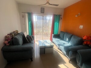 Living Room in 2 BHK Apartment at Kolte Patil Cheryl, Kharadi – for Sale