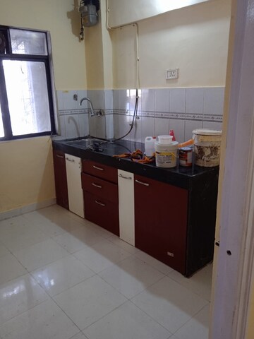 Kitchen in 2 BHK Apartment at Sarnath Chs, Vasant Vihar – for Rent