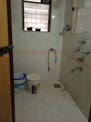 Bathroom in 2 BHK Apartment at Sarnath Chs, Vasant Vihar – for Rent