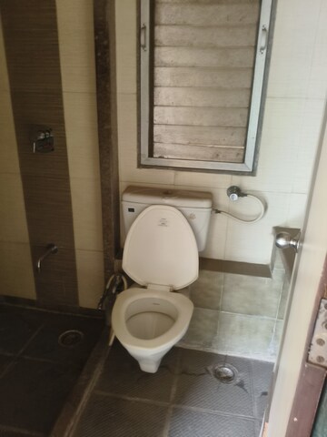 Bathroom in 2 BHK Apartment at Shree Gajanan Maharaj Nagar CHS, Kalyan West – for Rent