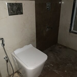 Bathroom in 2 BHK Apartment at Vasudev Terrace, Kastur Park – for Sale