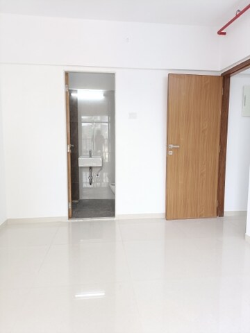 Room in 2 BHK Apartment at Romell Serene, Borivali West – for Rent
