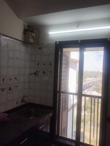 Kitchen in 1 BHK Apartment at Romell Serene, Borivali West – for Rent