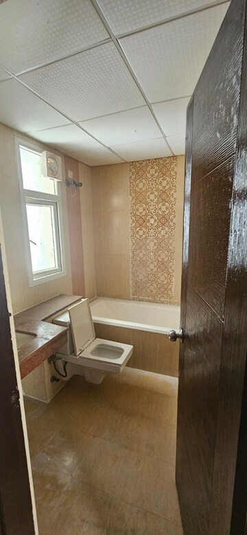 Bathroom in 3 BHK Apartment at Supertech Cape Town, Sector 74 – for Rent