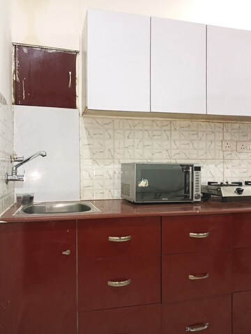Kitchen in 1 BHK Builder Floor at DLF Queens Court, Greater Kailash ii – for Rent