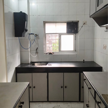 Kitchen in 1.5 BHK Apartment at Accord CHS Andheri West, Lokhandwala Complex – for Rent