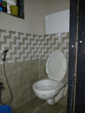 Bathroom in 1 BHK Apartment at Vastukala Niwara CHS, Goregaon West – for Rent