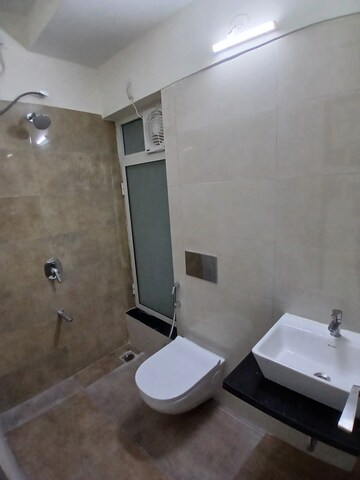 Bathroom in 1 BHK Apartment at Omkar Signet, Malad East – for Rent