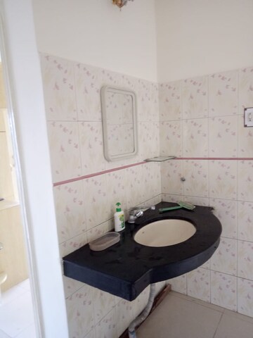 Bathroom in 3 BHK Apartment at Kusum Kunj, Prabhat Road – for Rent