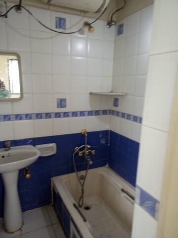 Bathroom in 3 BHK Apartment at Kusum Kunj, Prabhat Road – for Rent
