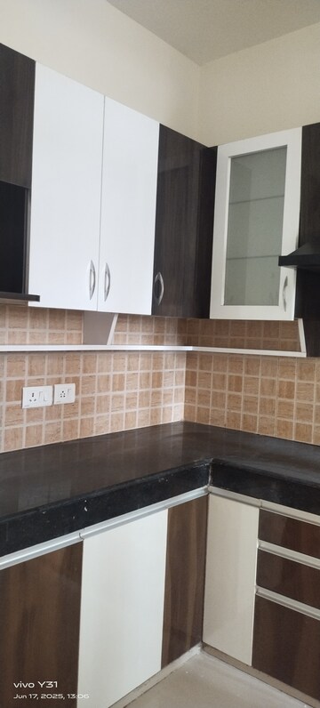 Kitchen in 3 BHK Apartment at Mahagun Mywoods, Sector 16c Greater Noida – for Rent