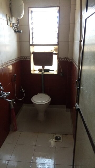 Bathroom in 1 BHK Apartment at Madhu Residency Andheri, Sher E Punjab Colony – for Rent