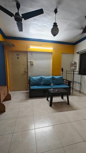 Living Room in 1 BHK Apartment at Poonam Enclave, Goregaon East – for Rent