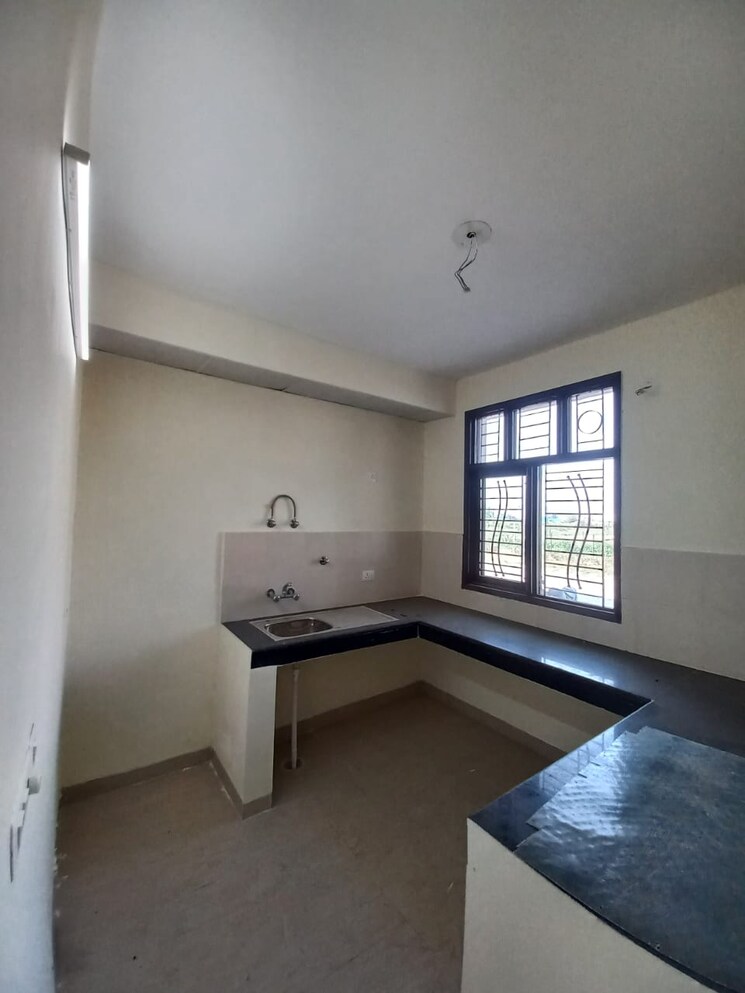 Kitchen, wave-prime-floors 2.5 Bedroom 1255 Sq.Ft. Independent House In Wave City Ghaziabad 8834345