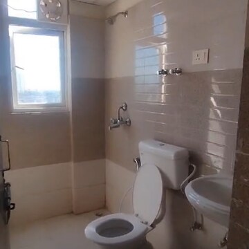 Bathroom in 2 BHK Apartment at Signature Global Orchard Avenue, Sector 93 – for Sale