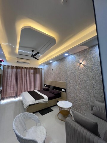 Living Room in Studio Apartment at Gaur City Mall, Sector 4 Greater Noida – for Rent