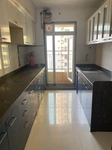 Kitchen in 2 BHK Apartment at Rustomjee Urbania Athena, Majiwada – for Sale
