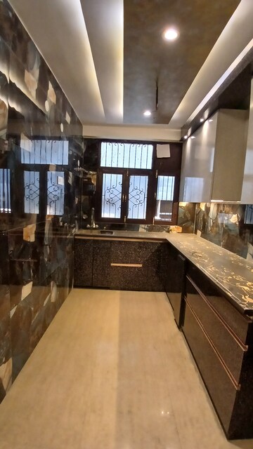 Kitchen in 4 BHK Apartment at Noor Nagar – for Sale