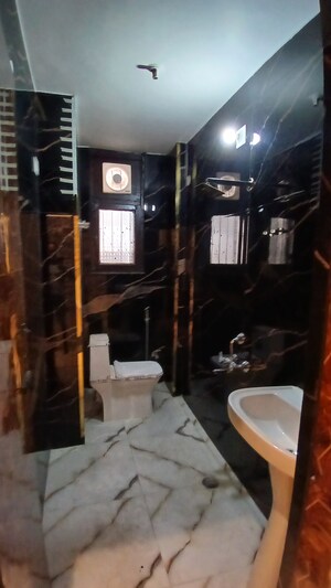 Bathroom in 4 BHK Apartment at Noor Nagar – for Sale
