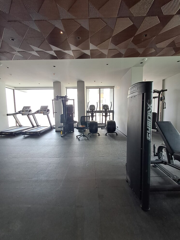 Gym, dev-leo-tower 2 Bedroom 670 Sq.Ft. Apartment In Oshiwara Mumbai 8834490