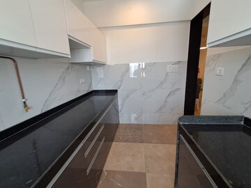 Kitchen in 2 BHK Apartment at Dev Leo Tower, Oshiwara – for Sale