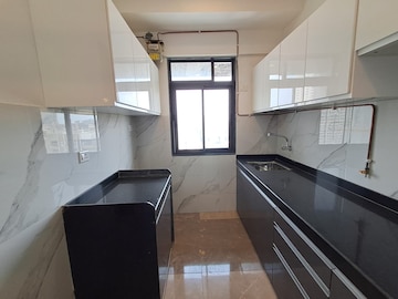 Kitchen in 2 BHK Apartment at Dev Leo Tower, Oshiwara – for Sale