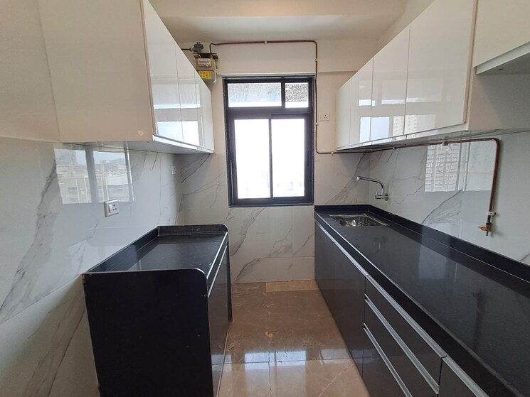 Kitchen, dev-leo-tower 2 Bedroom 670 Sq.Ft. Apartment In Oshiwara Mumbai 8834490